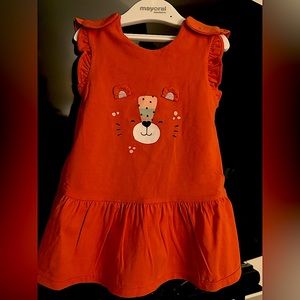 NWT. Infant/toddler orange Cotton dress. Brand: Mayoral/ Sizes: 12M